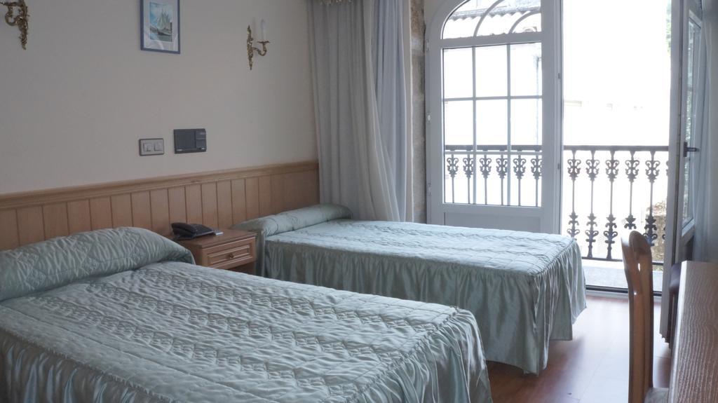 Hotel Larry Cee Rum bild
